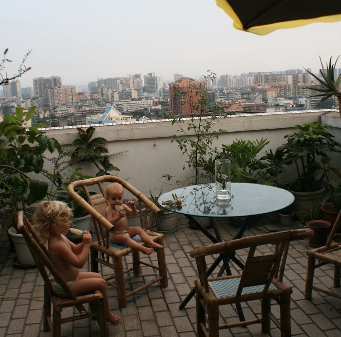 Thoroughly enjoying popsicles on the roof in Chengdu